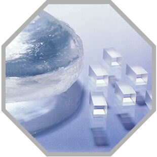 Beta-Barium Borate in a grey comb with blue blackground