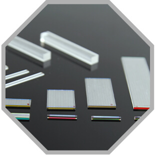 Periodically poled lithium niobate Chips & Waveguides are shown in  a grey comb